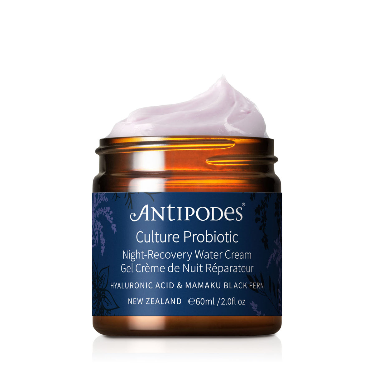 Antipodes night-recovery water cream jar with visible cream on a white background